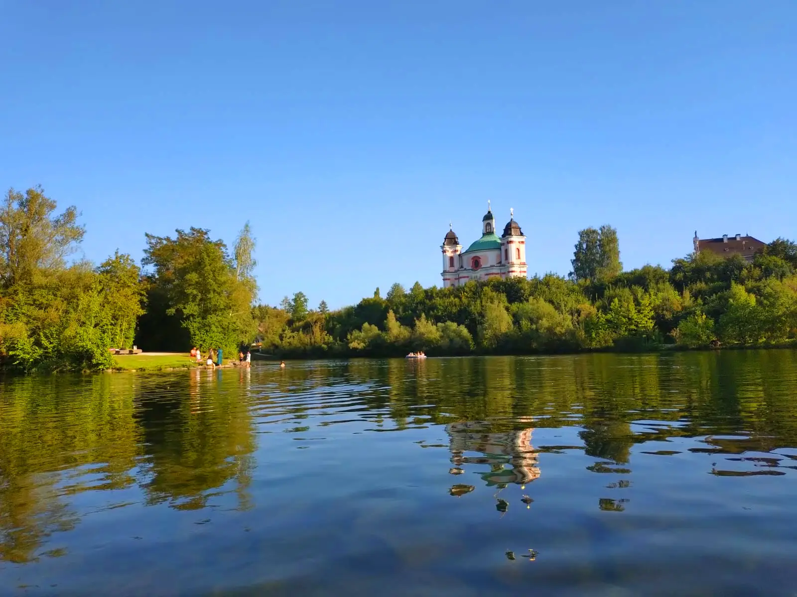Bathing Island, Paura Church and Lambach Abbey on the Traun